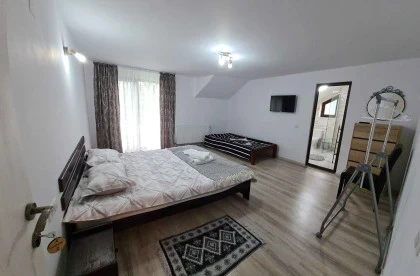 Dormitor_cu_doua_paturi.webp